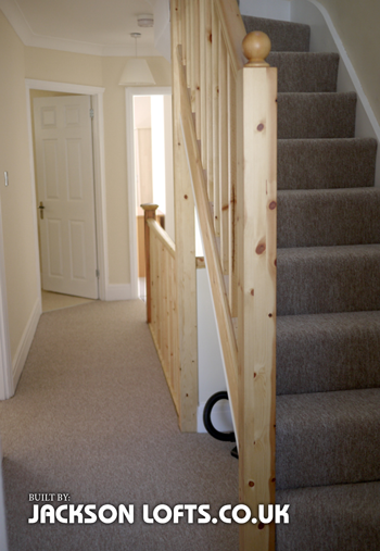 Terrace house loft conversion staircase with storage built by Jackson Lofts, Brighton